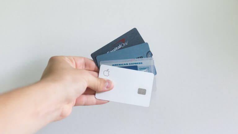 Hand holding credit cards