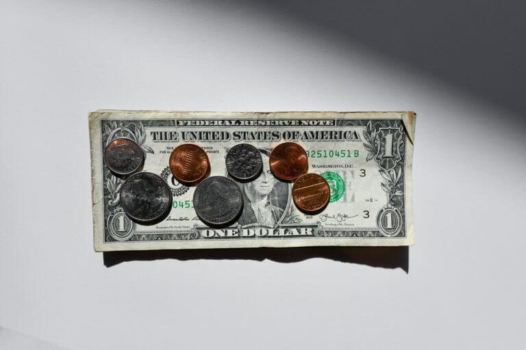 Cash with coins on it