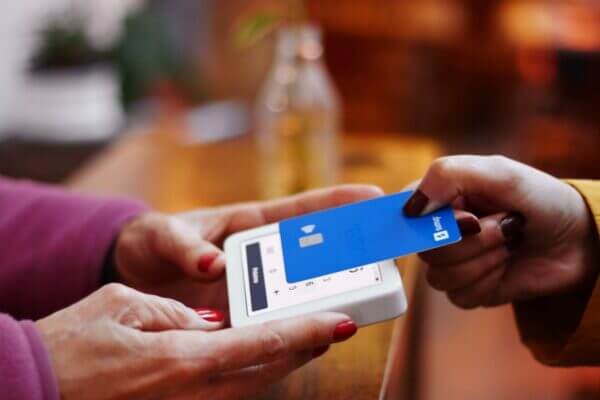 Woman paying with credit card