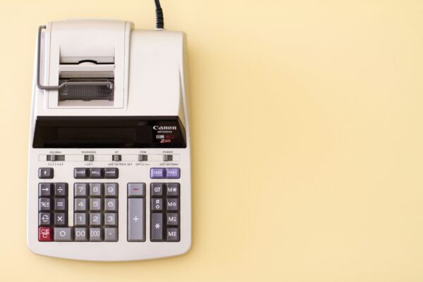 Photo of a manual accounting calculator on a desk