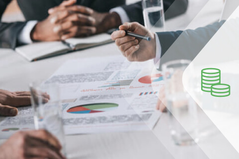 A pair of hands at a business table